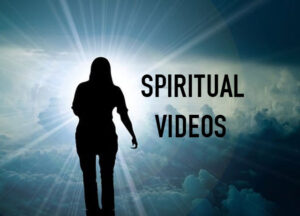 A female silhouette in blue clouds with rays of light coming out behind her. The words Spiritual Videos in black.